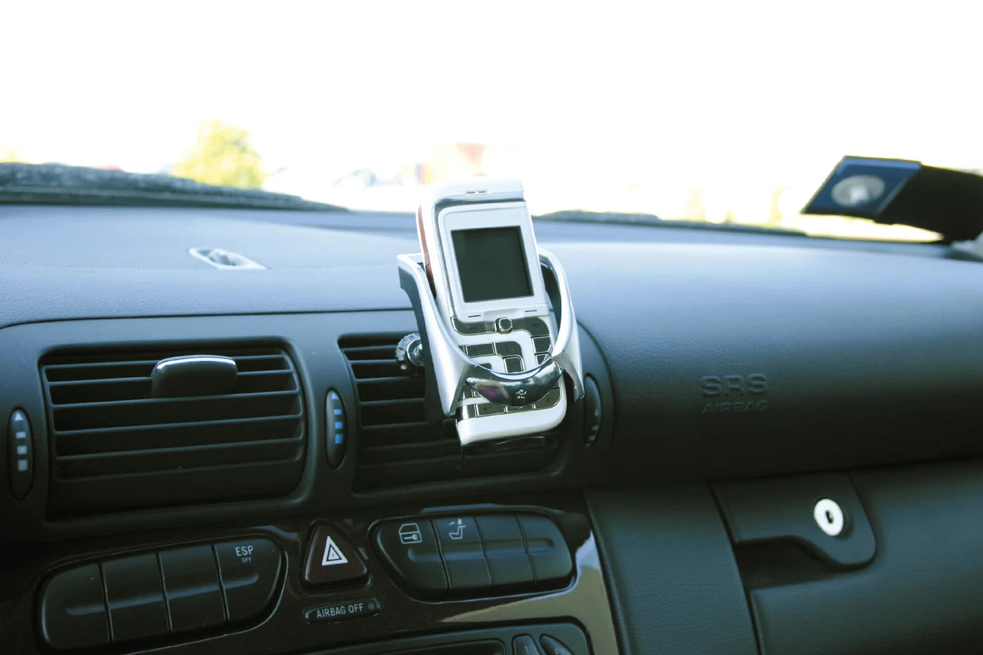 Futura, portatelefono adesivo o clip